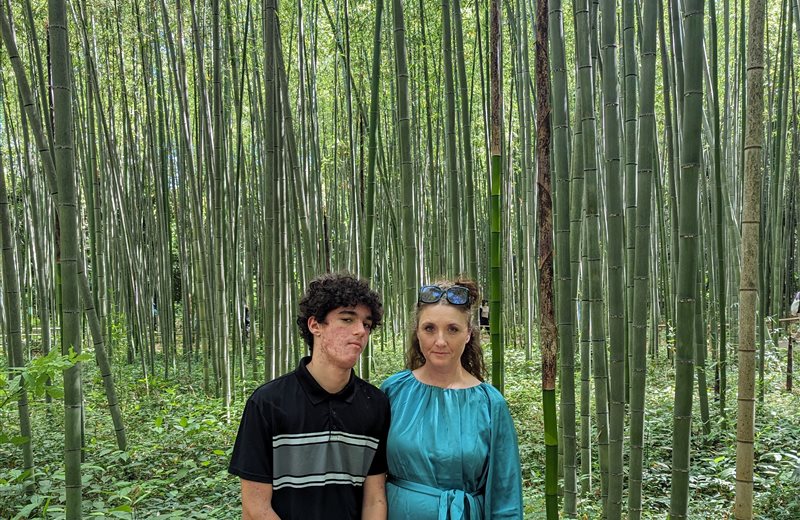 Jillian and her son Tom in a bamboo forest in Japan