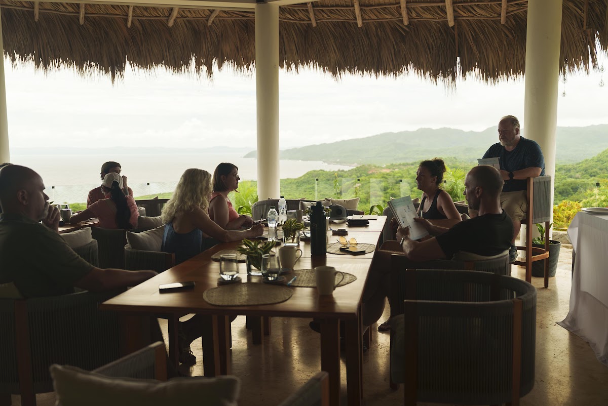 Group dinner in the open-air restaurant overlooking the bay